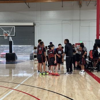 ISO Elite Basketball - Coach AB going over game plan at the tournament - Basketball Courts Near Me - Pomona, California ISO Elite Basketball - Coach AB going over game plan at the tournament - Basketball Courts Near Me - Pomona, California