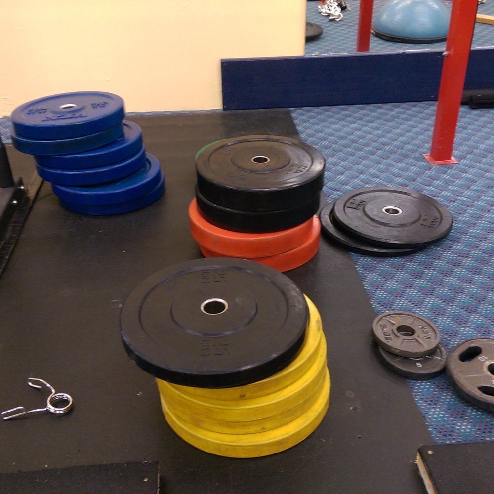 Polo's Gym - Nice selection of color-coded weights (a few more than what's shown here -- a few more 10's) - Gyms Near Me - Oakland, California Polo's Gym - Nice selection of color-coded weights (a few more than what's shown here -- a few more 10's) - Gyms Near Me - Oakland, California
