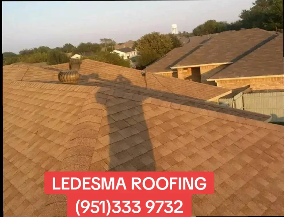 Slide of Ledesma Roofing