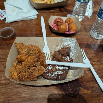 Buttermilk and Honey - French toast and chicken (nearest) and fried pimento balls (furthest) with bottled water - Cafes Near Me - Richmond, Virginia Buttermilk and Honey - French toast and chicken (nearest) and fried pimento balls (furthest) with bottled water - Cafes Near Me - Richmond, Virginia