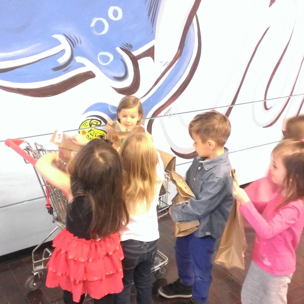 Teaching the children about giving. Our annual children's ministry food drive. Teaching the children about giving. Our annual children's ministry food drive.