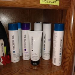 Olde Tyme Barber Shop - Paul Mitchell shampoos conditioners and gels