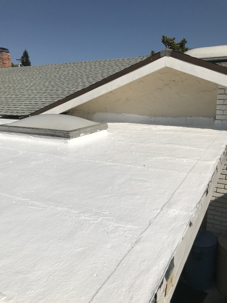 Slide of J V Roofing