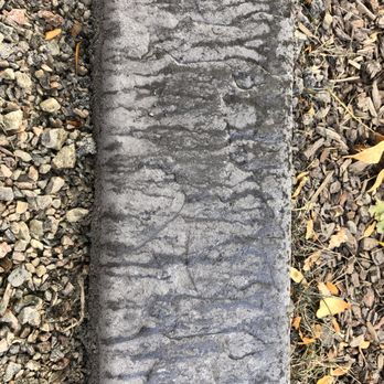 Decorative Landscape Borders - coloring washed off because wasn't sealed properly - Landscaping Near Me
