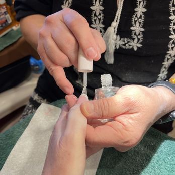 Oscar Nails Day Spa - Joanne finishing my pink & white dip - Nail Salons Near Me - Carrollton, Texas