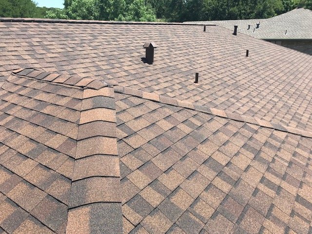 Slide of Tomlin Roofing Professionals