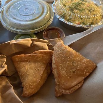 Inchin's Indian Kitchen - Vegetable samosas with chutney and sauce - Indian Near Me - Niagara Falls, Ontario Inchin's Indian Kitchen - Vegetable samosas with chutney and sauce - Indian Near Me - Niagara Falls, Ontario