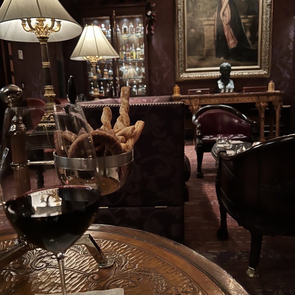 Rarities - a glass of wine on a table - Lounges Near Me - New York, New York Rarities - a glass of wine on a table - Lounges Near Me - New York, New York