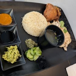 Maxwell Chicken Rice - Hainan chicken plate with a fried chicken