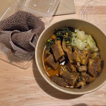 Hoyo's Kitchen - Goat and injera. - African Near Me - Dublin, Ohio Hoyo's Kitchen - Goat and injera. - African Near Me - Dublin, Ohio