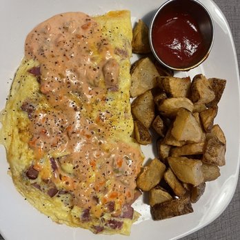 Casey's - Conway Omelette with two thousand island dressing - Breakfast & Brunch Near Me - Fredericksburg, Virginia Casey's - Conway Omelette with two thousand island dressing - Breakfast & Brunch Near Me - Fredericksburg, Virginia