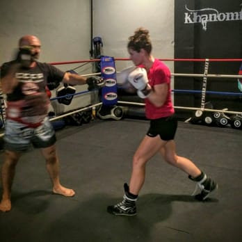 Tampa Muay Thai - Trainer David Gogichaishvili with an impressive fight record of over 100 fights holds boxing rounds - Martial Arts Near Me - Tampa, Florida