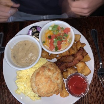 B Matthews Eatery - The Lamp Post (eggs your way, biscuit and side of gravy, breakfast potatoes, loaded grits and bacon) - New American Near Me - Savannah, Georgia B Matthews Eatery - The Lamp Post (eggs your way, biscuit and side of gravy, breakfast potatoes, loaded grits and bacon) - New American Near Me - Savannah, Georgia