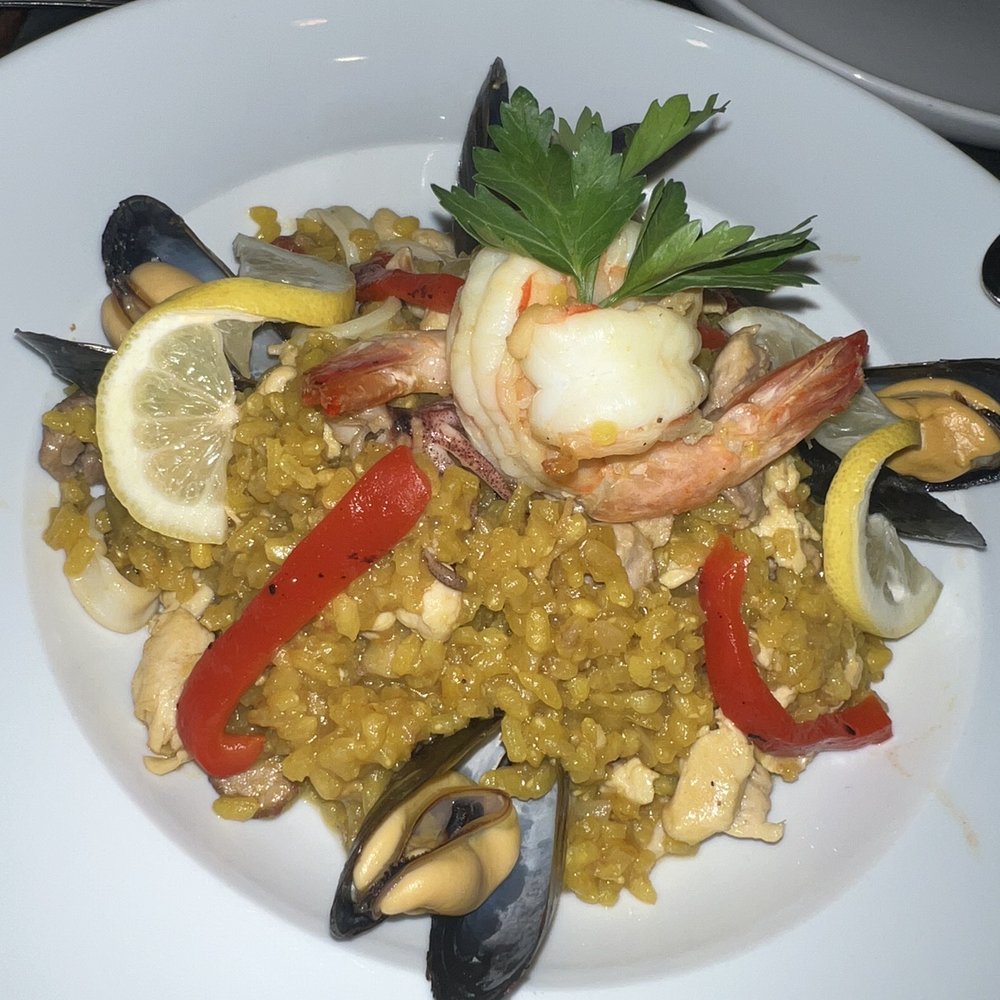 Costa Brava Bistro - Angeles' Paella with Shrimp, Calamari, Mussels, Chicken, Pork & Beef - Spanish Near Me - Bellaire, Texas
