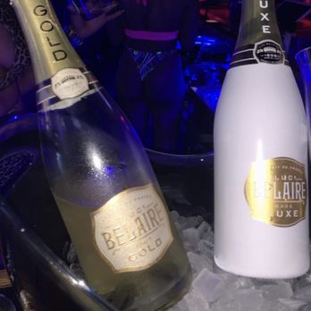 Reign - two bottles of champagne in a bucket with ice - Strip Clubs Near Me - Paterson, New Jersey Reign - two bottles of champagne in a bucket with ice - Strip Clubs Near Me - Paterson, New Jersey