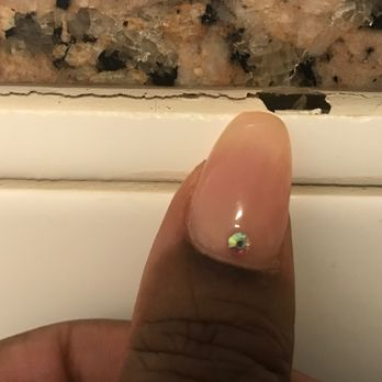 Harlem Property Re+Development - Corking btwn granite counter top & backsplash is chipped. This photo was taken right after renovation in 2017 so this is NOT from age/wear. - General Contractors Near Me - New York, New York
