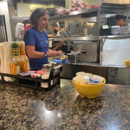 Sitting at the food bar- this is the owner :) Sitting at the food bar- this is the owner :)