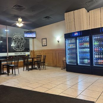Planet Pizza - Some small tables and also to the left there is a row of tables - Pizza Near Me - Newburgh, New York