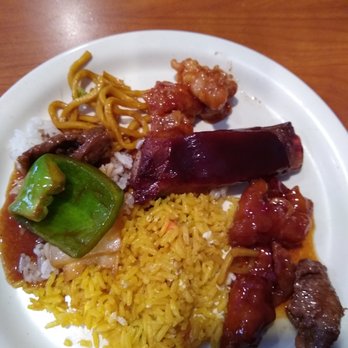 Fusion Buffet - a plate of food on a wooden table - Buffets Near Me - DuBois, Pennsylvania Fusion Buffet - a plate of food on a wooden table - Buffets Near Me - DuBois, Pennsylvania