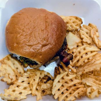 Pluckers Wing Bar - Oak Hill - Top View of the Bypass Burger and Waffle Fries - Chicken Wings Near Me - Austin, Texas