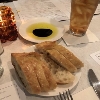 Fuzio Universal Bistro - Tasty complimentary bread with vinegar and oil - New American Near Me - Modesto, California Fuzio Universal Bistro - Tasty complimentary bread with vinegar and oil - New American Near Me - Modesto, California