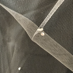 Rena Elle Couture - Clump of glue sticking to the veil.
