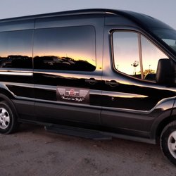 Top Shelf Transportation - The sunset off of one of our 14-passenger vans. Taken on location of a desert wedding!