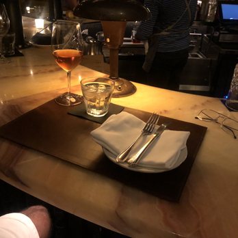 St. Anselm - Designer marble bar top and sleek leather table mat - Steakhouses Near Me - Washington, DC, District of Columbia