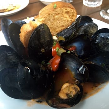Riccardo Enoteca - mussels in a light tomato broth with capers & so amazing - Italian Near Me - Chicago, Illinois Riccardo Enoteca - mussels in a light tomato broth with capers & so amazing - Italian Near Me - Chicago, Illinois
