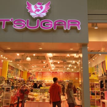 IT'SUGAR - a store front with a neon sign - Candy Stores Near Me - Gurnee, Illinois