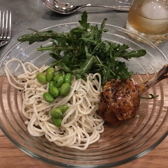 The Crown - a glass plate with noodles, meat and vegetables - Bars Near Me - Oklahoma City, Oklahoma