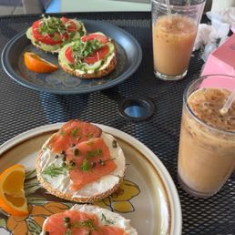 Top left: Garden Bagel Bottom: Salmon Bagel Two Iced dirty Chai lattes Top left: Garden Bagel Bottom: Salmon Bagel Two Iced dirty Chai lattes