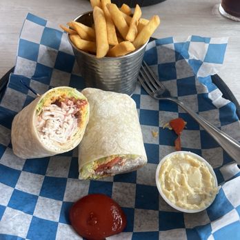 Wooden Spoon Eatery - Turkey and cranberry wrap. - Wine Bars Near Me - Surfside Beach, South Carolina Wooden Spoon Eatery - Turkey and cranberry wrap. - Wine Bars Near Me - Surfside Beach, South Carolina