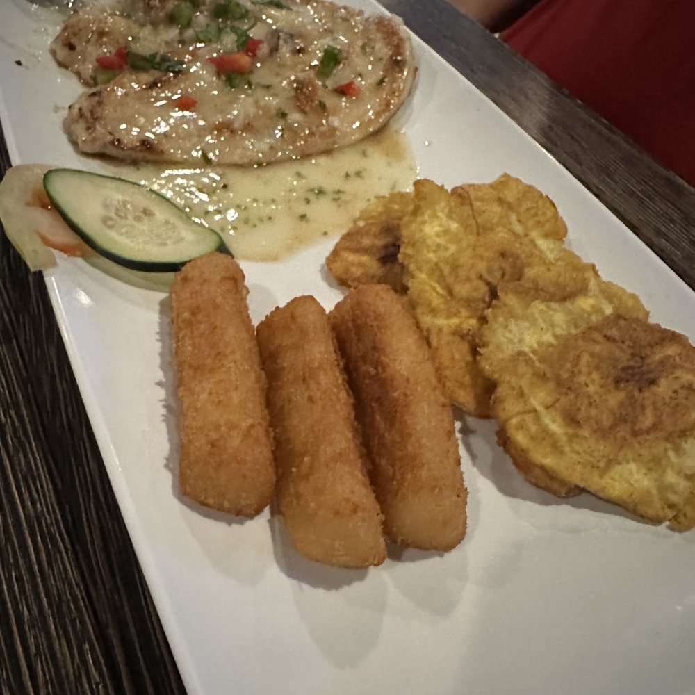 CocoCabana Bar & Grill - Grilled chicken with tostones, and yuca frita - Latin American Near Me - Greenacres, Florida