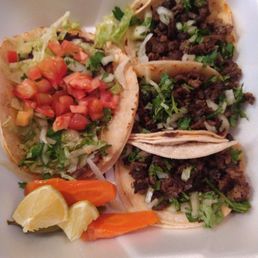 Fish taco on the left...Daily special of 3 carne steak tacos on the right. Fish taco on the left...Daily special of 3 carne steak tacos on the right.