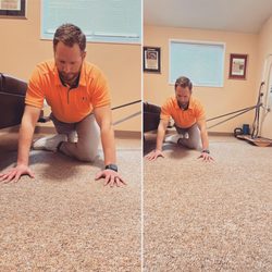 Family Chiropractic Center - Dr. Scott demonstrating a banded hip stretch.