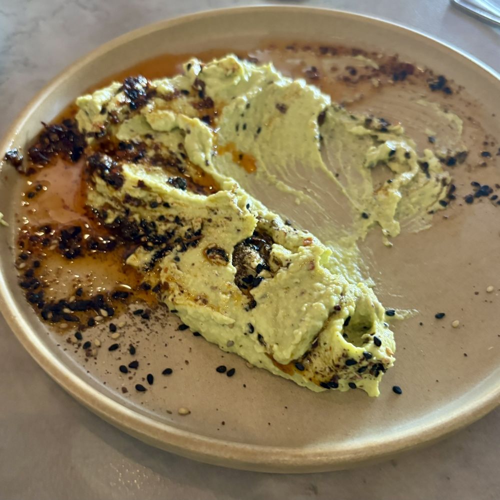 Gràcia Mediterranean - half eaten hummus - Cocktail Bars Near Me - Austin, Texas Gràcia Mediterranean - half eaten hummus - Cocktail Bars Near Me - Austin, Texas