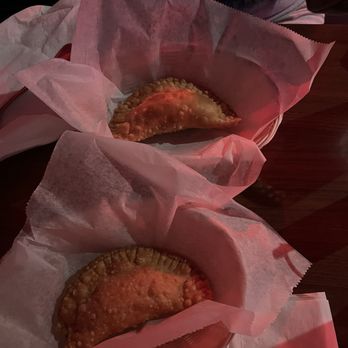 Mofon Go City - two pastries on a table - Caribbean Near Me - Fairfield, Ohio