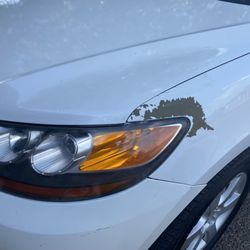 Jiffy Lube - They sanded over the tape and peeled off my paint.
