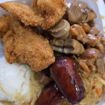 Mama Lucy's Kitchen - $17 for pig feet adobo, half rice, half pancit, two large pieces of fried fish and two sausages - Filipino Near Me - Lihue, Hawaii