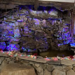 a stone wall with colorful lights a stone wall with colorful lights