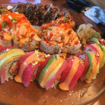 Sushi Cruise - Flame roll (front), hurricane roll (middle), Godzilla (back) - Sushi Bars Near Me - Edgewater, New Jersey Sushi Cruise - Flame roll (front), hurricane roll (middle), Godzilla (back) - Sushi Bars Near Me - Edgewater, New Jersey