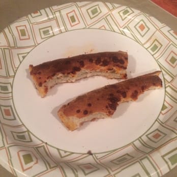 IL Primo Pizza & Wings - Scraps!  Who gets these, the kid or the dog.  And the race is on! - Pizza Near Me - Naples, Florida