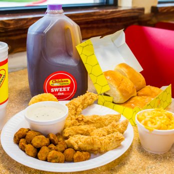 Chicken Express - a plate of chicken nuggies, fries and a drink - Chicken Wings Near Me - Taylor, Texas