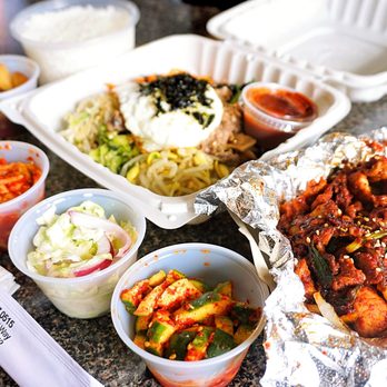 Stone Korean Restaurant - Spicy Pork Bulgogi + Bibimbap Combo: served with a sizzling hot stone pot rice and side dishes ($25). - Korean Near Me - Redmond, Washington Stone Korean Restaurant - Spicy Pork Bulgogi + Bibimbap Combo: served with a sizzling hot stone pot rice and side dishes ($25). - Korean Near Me - Redmond, Washington