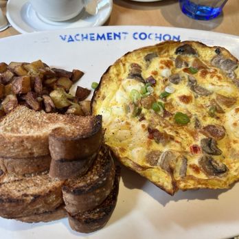 Cochon Dingue - Tasty omelet with potatoes, wheat toast with house made jam and apple butter. Yum!! - Breakfast & Brunch Near Me - Quebec City, Quebec Cochon Dingue - Tasty omelet with potatoes, wheat toast with house made jam and apple butter. Yum!! - Breakfast & Brunch Near Me - Quebec City, Quebec