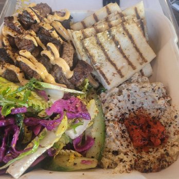 Limoné Mediterranean - Beef shawarma with their house harissa sauce and babaganoush and salad as sides. Rice is under beef. - Mediterranean Near Me - Glendora, California Limoné Mediterranean - Beef shawarma with their house harissa sauce and babaganoush and salad as sides. Rice is under beef. - Mediterranean Near Me - Glendora, California