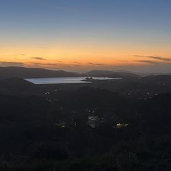 Reservoir seen from trail at sunset