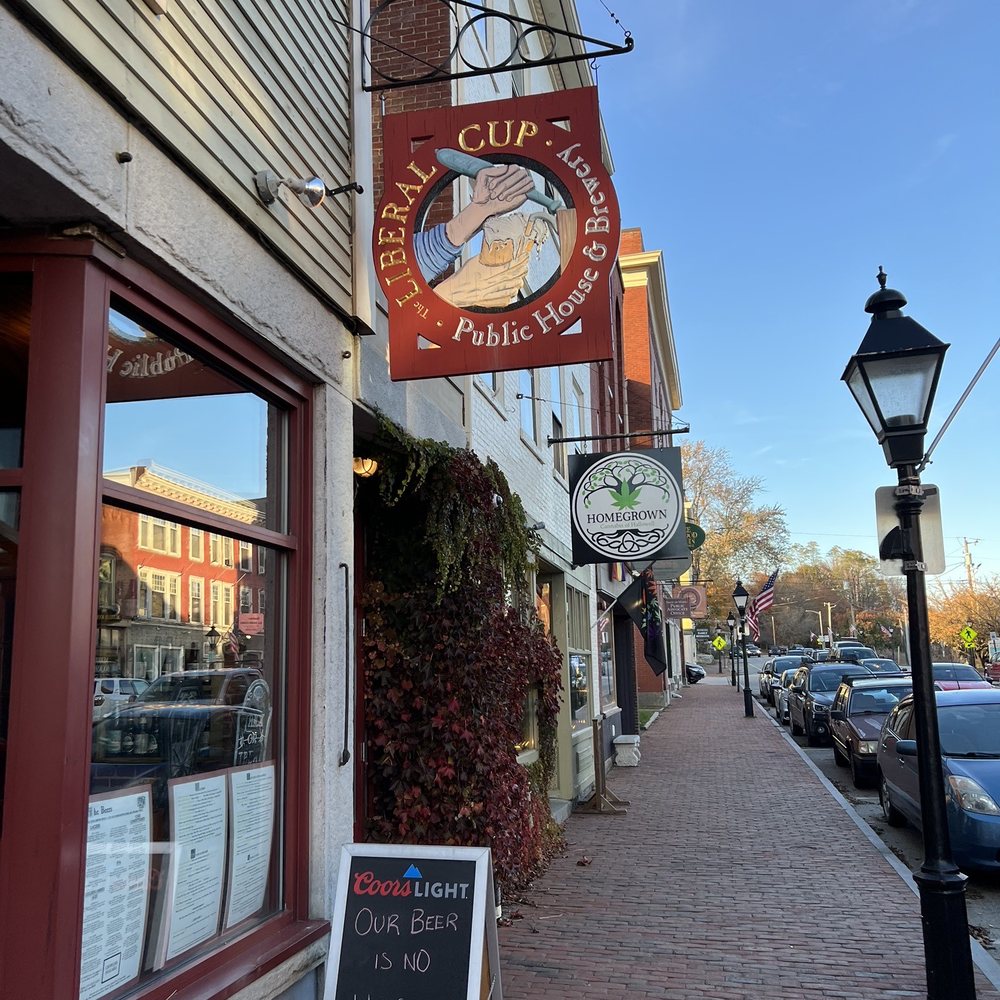 a sign for a local coffee shop a sign for a local coffee shop