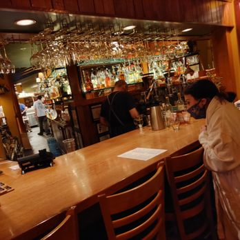 Hal’s Cafe - McMenamins - a woman at a bar - Bars Near Me - Portland, Oregon Hal’s Cafe - McMenamins - a woman at a bar - Bars Near Me - Portland, Oregon